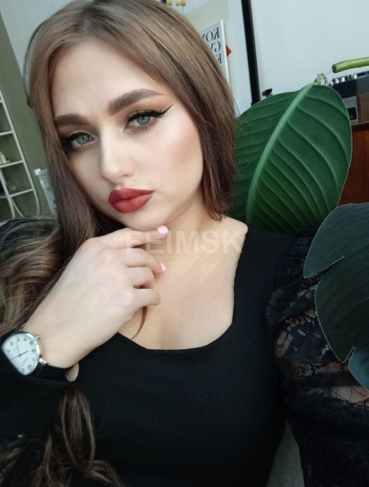 Мила
